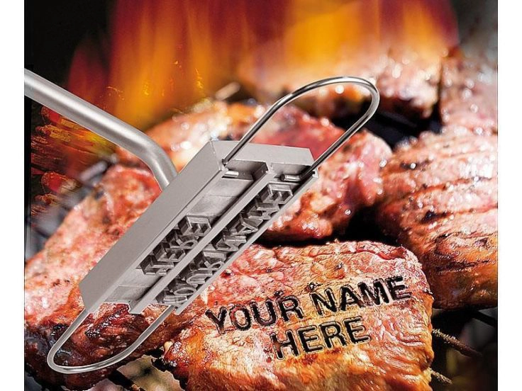 Grillfleisch Brandeisen für Schriftzug auf dem Steak