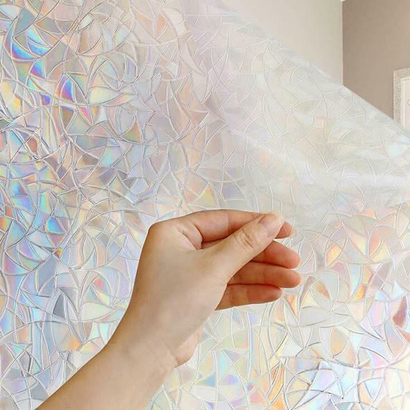 Regenbogen-Folie mit Hand