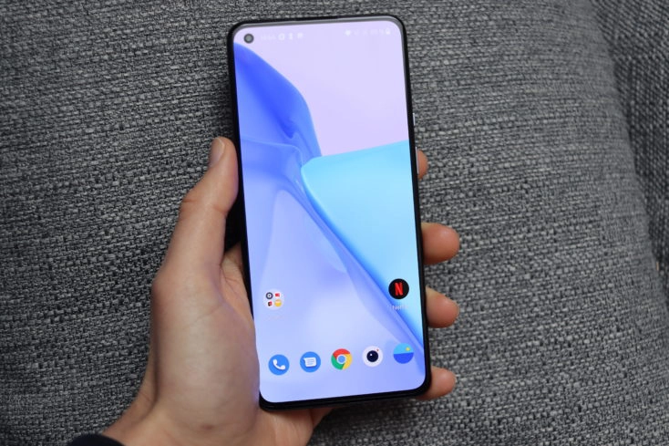 OnePlus 9 Smartphone in Hand