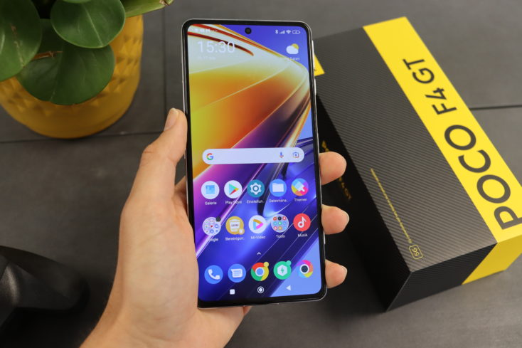 POCO F4 GT Smartphone Display in Hand
