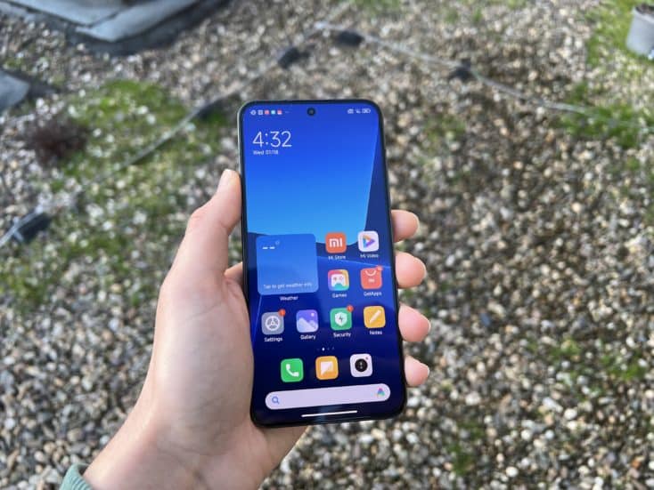Xiaomi 13 Smartphone Display in Hand